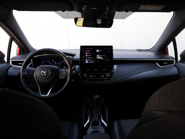 Toyota Corolla Touring Sports Hybrid 200 Dynamic | Half Leder | Stoelverwarming | Parkeersenso