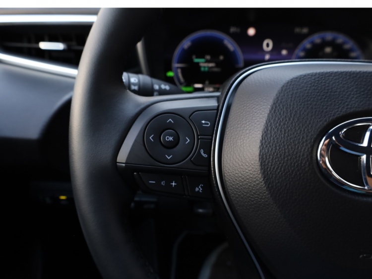 Toyota Corolla Touring Sports Hybrid 200 Dynamic | Half Leder | Stoelverwarming | Parkeersenso