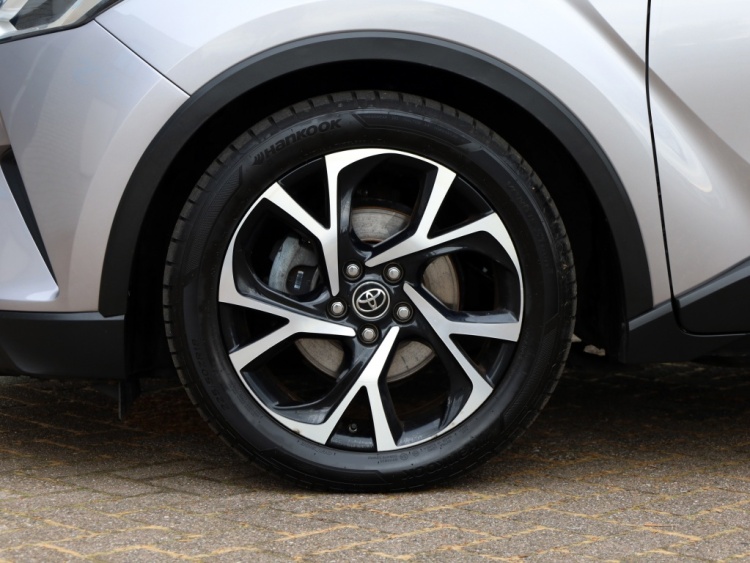 Toyota C-HR 1.8 Hybrid Bi-Tone | JBL Audio | Stoelverwarming | Navigatie